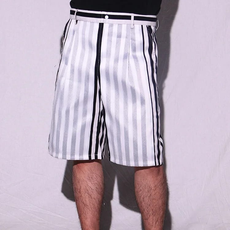 Model wearing fibre optic rave shorts.