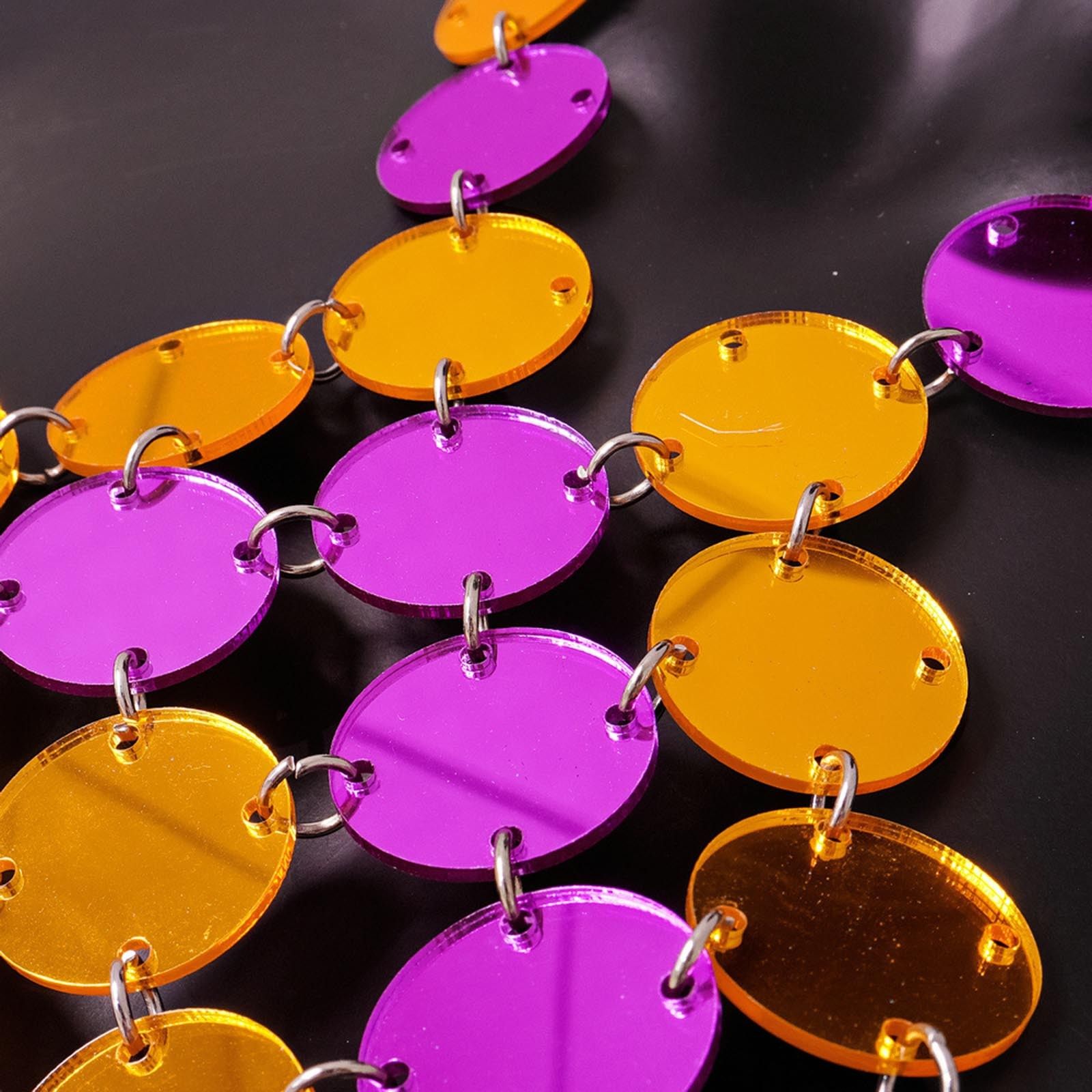 Sequin Circle Chain Skirt - detailed macro shot of the purple and gold acrylic discs | Ravers Co