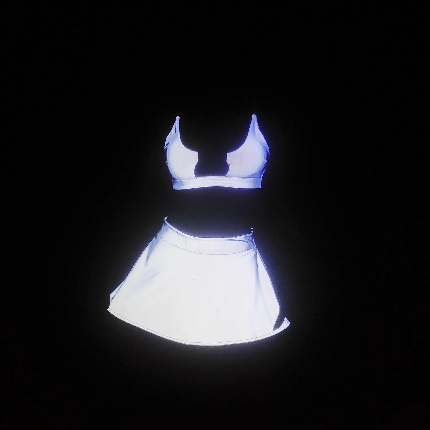White Reflective Rave Set 2 A photo of the White Reflective Rave Set under a flash