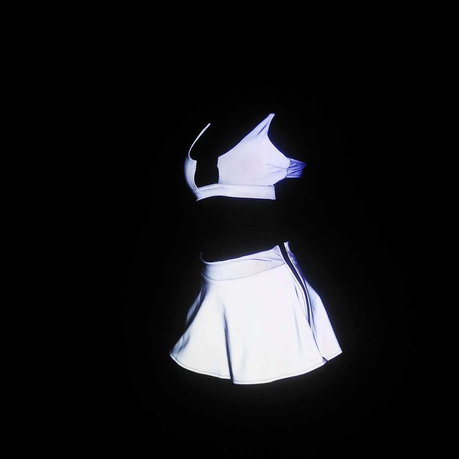 White Reflective Rave Set 3 A photo of the White Reflective Rave Set side on under a flash