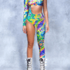 Rainbow Spill Cut-Out Jumpsuit on model, front view | Ravers Co