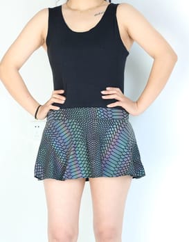 Reflective Rainbow Snakeskin Skirt on model, front view | Ravers Co