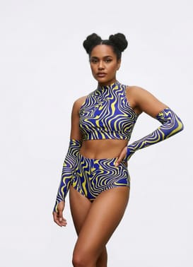A photo of a model wearing the twisted ripple rave set