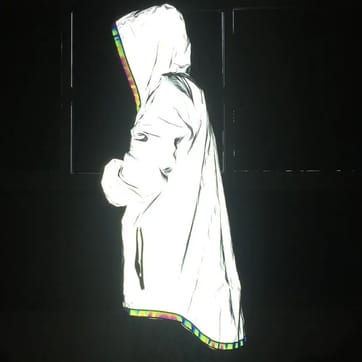Iridescent Reflective Rave Jacket - front view on model | Ravers Co