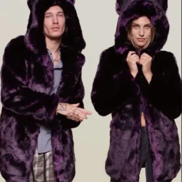 A photo of a man and woman each wearing the Fluffy Rave Creature Coat
