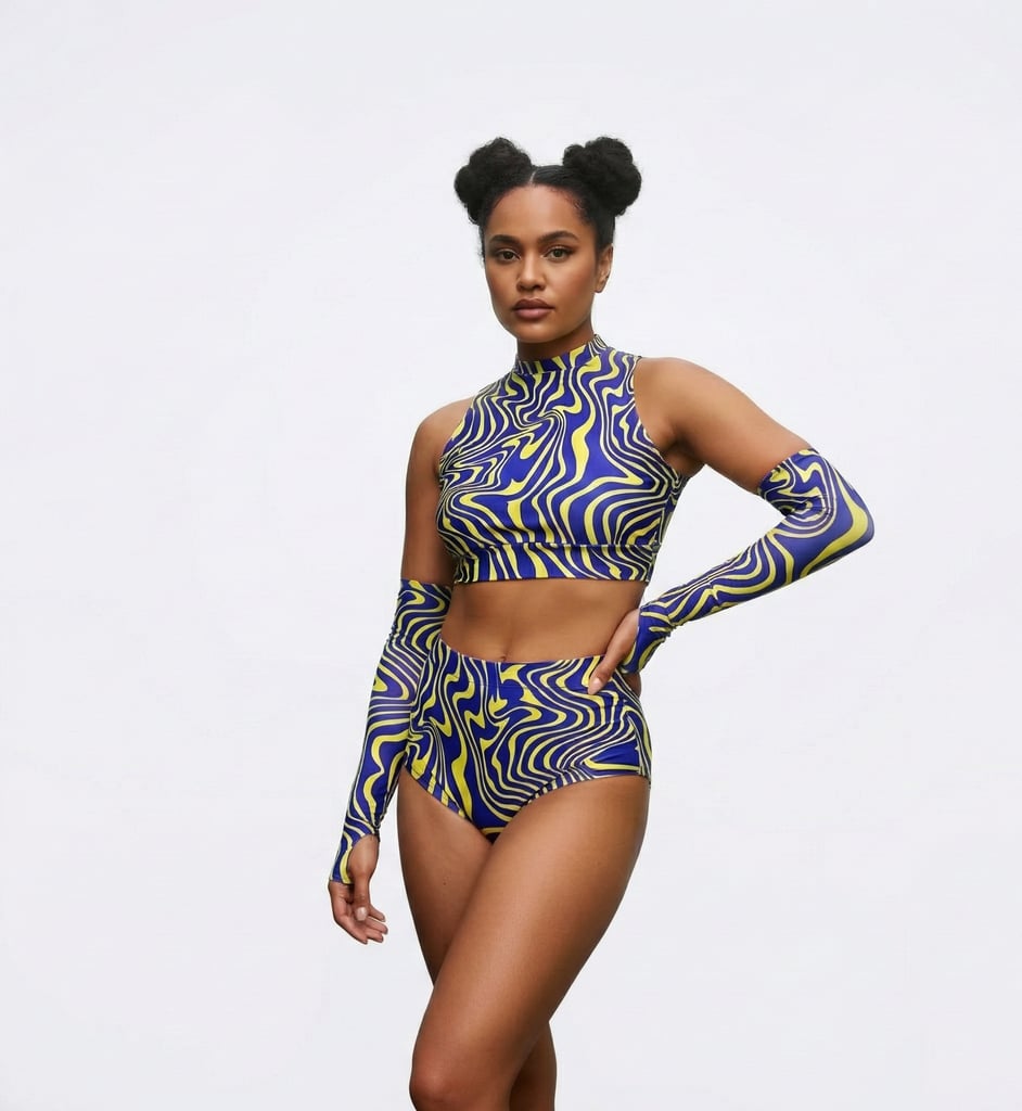 Twisted Ripple Rave Set - model wearing blue and yellow psychedelic 3-piece outfit | Ravers Co