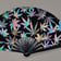 Leafy Breeze Hand Fan - glowing iridescent leaf print under flashing festival lights | Ravers Co