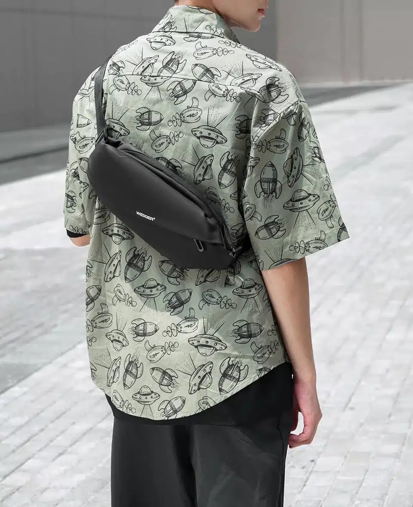 Waterproof X-Body Rave Bag in Black - front view | Ravers Co
