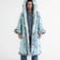 LED Fur Sequin Cloak - Front view in dim and normal lighting | Ravers Co