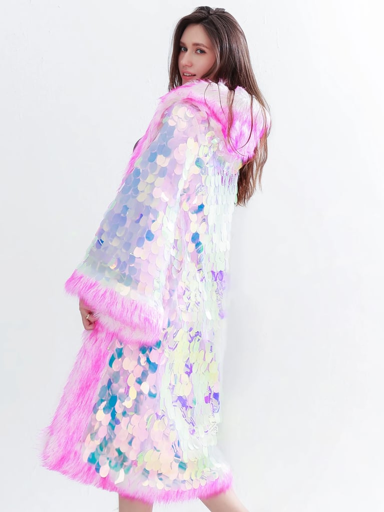 Venus Pink LED Sequin Fur Cloak - model posing in a festival setting | Ravers Co