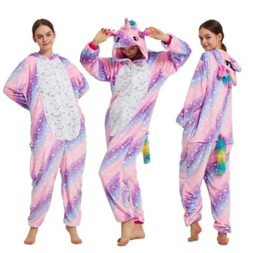 Picture of a model wearing the purple stars unicorn onesie