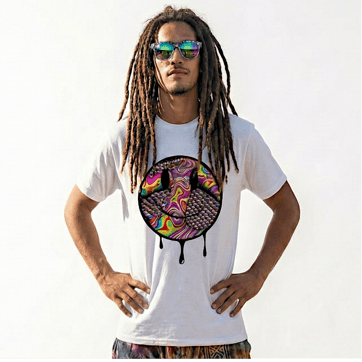 A mid shot photo of Mana wearing the melting smiley acid tee