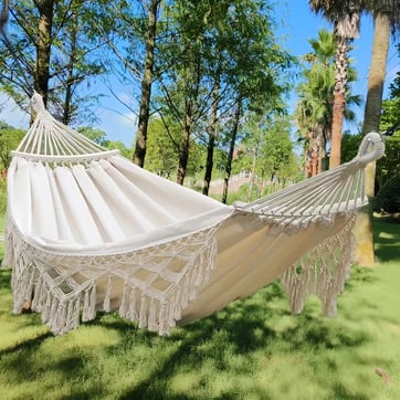 Bohemian Festival Hammock in white at a festival campsite | Ravers Co