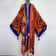 Paisley Print Rave Kaftan in vibrant purple and orange rayon fabric | Ravers Co