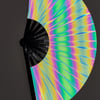 Rainbow Aura Hand Fan with iridescent fabric catching a camera flash | Ravers Co
