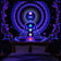 Chakra Black Light Tapestry glowing vibrantly under a UV light | Ravers Co